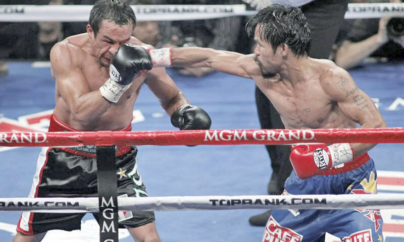 Manny Pacquiao îşi păstrează titlul mondial (WBO) după o victorie la puncte cu Juan Manuel Marquez